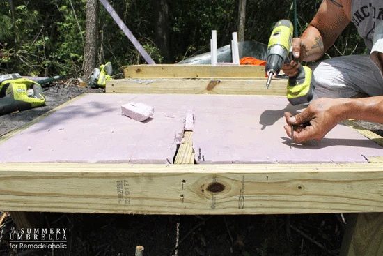 how to make a modest-cost friendly low-cost backyard waterfall - use foam, pvc, lumber, and concrete to make a Handmade waterfall feature