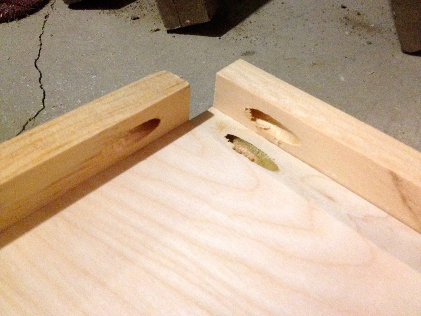 corner pocket holes, open media shelf