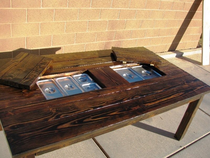 Patio table with built in stream trays featured on @Bekob