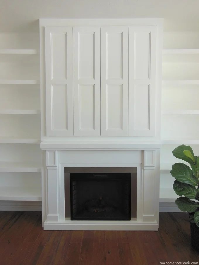 Hidden TV in Built In Fireplace by Our Home Notebook featured on Bekob