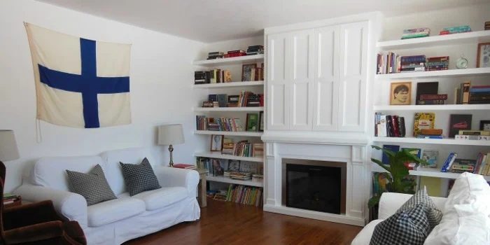 Built-In Fireplace Surround and Shelving with Hidden TV Nook
