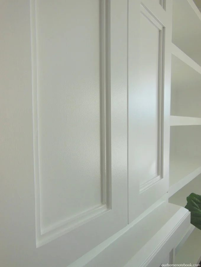 TV Nook with Bi-Fold Doors Above a Fireplace by Our Home Notebook featured on Bekob