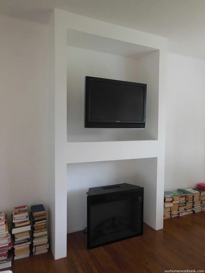 Fireplace and TV Built In by Our Home Notebook featured on Bekob
