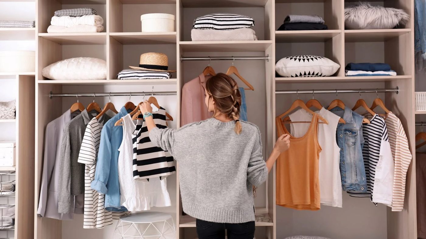 Woman Organizing Closet