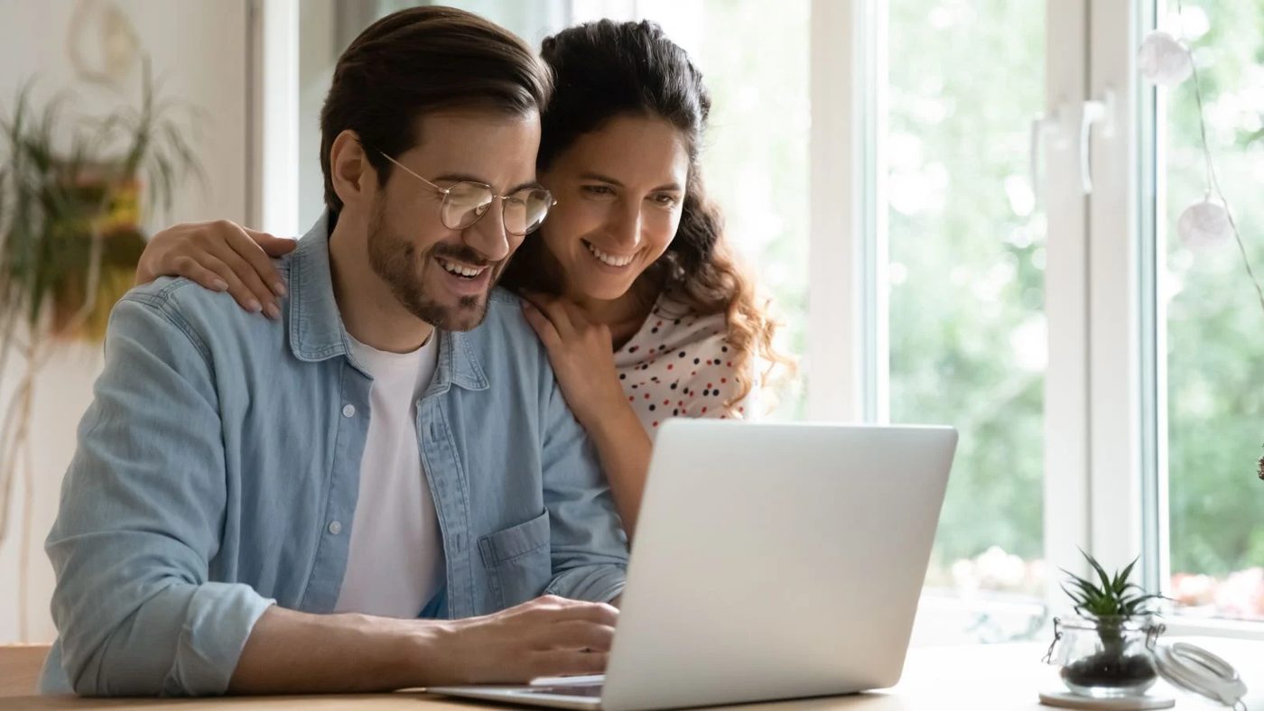 Couple Looking At Computer