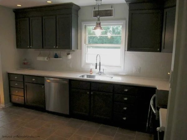 Updated Remodeled And Painted Charcoal Dark Grey Kitchen Cabinets In Sherwin Wiliams Peppercorn Gray And White Countertops, Featured On Bekob