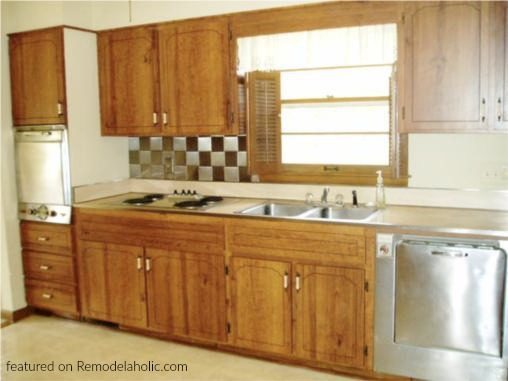 Before Kitchen Renovation With Painted Dark Grey Kitchen Cabinets And White Countertops, Featured On Bekob