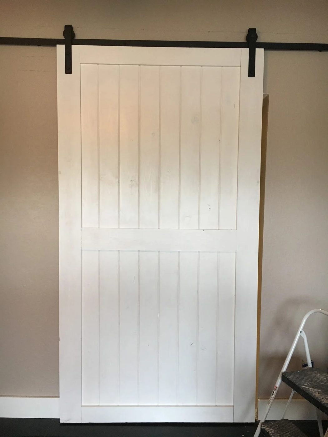 handmade-sliding-door-using-hardware-found-on-ebay-over-inspired-featured-on-Bekob