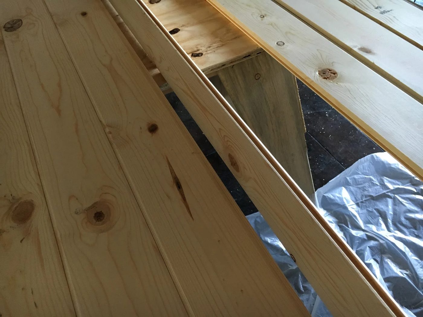 how-to-use-tongue-and-groove-lumber-to-build-a-sliding-barn-door-over-inspired-featured-on-Bekob