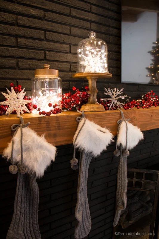 Looking to decorate your mantel for Christmas, but aren't sure where to start? Try these tips for creating a whimsical and rustic Christmas Mantel featured on Bekob.com