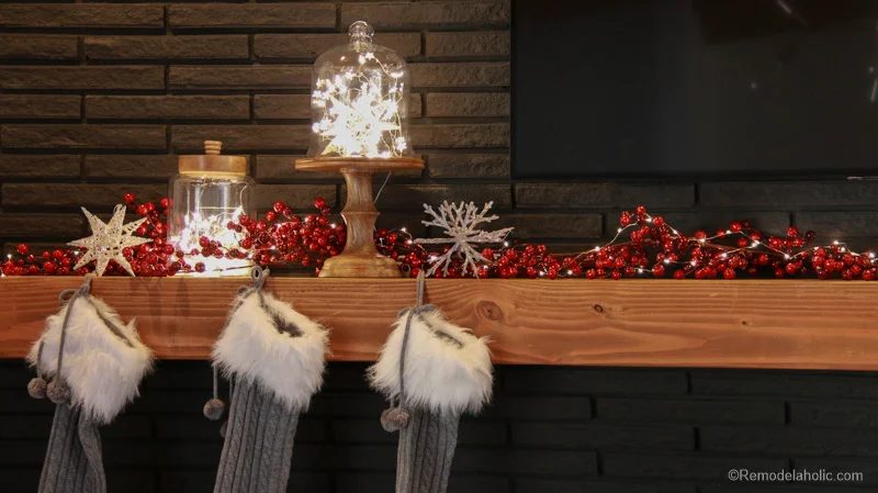 Looking to decorate your mantel for Christmas, but aren't sure where to start? Try these tips for creating a whimsical and rustic Christmas Mantel featured on Bekob.com