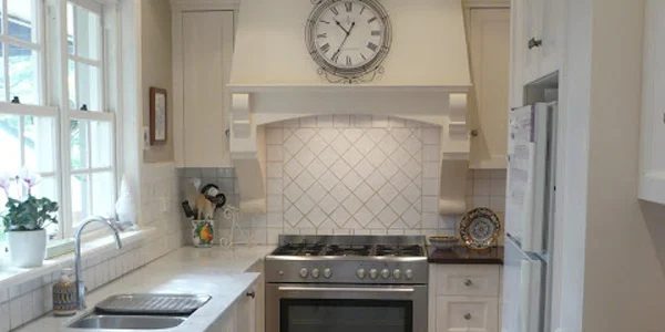 Classically striking Galley Kitchen Before and After