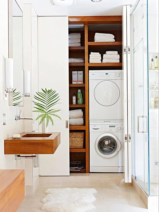 Share Powder Room with Laundry and hide it behind closet doors featured on Remodelahoilc.com