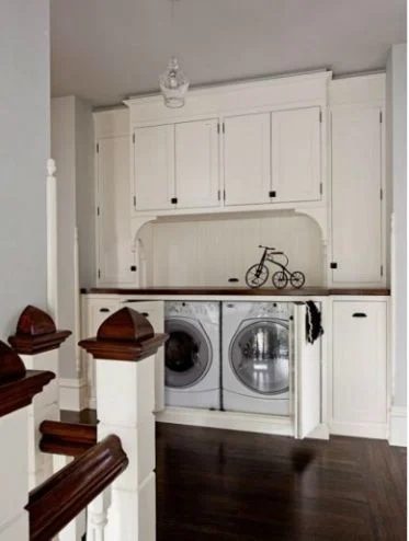 Hallway Laundry Space built in hidden laundry featured on Bekob.com
