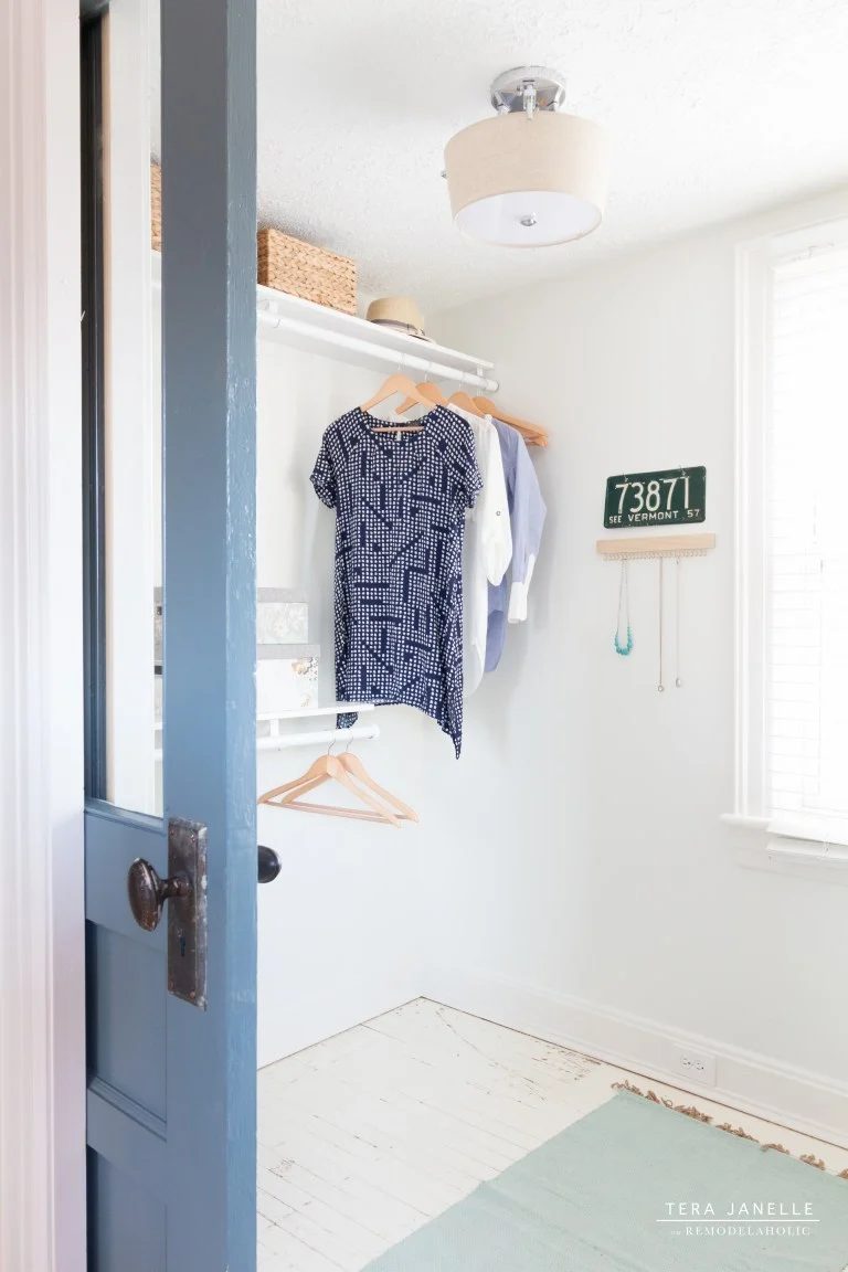 Handmade Walk In Closet With Blue Wall
