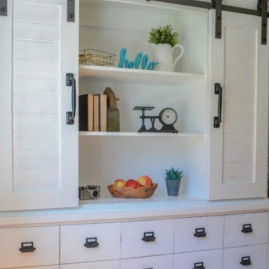 Built In Shelves With Cupboard And Sliding Cupboard Doors