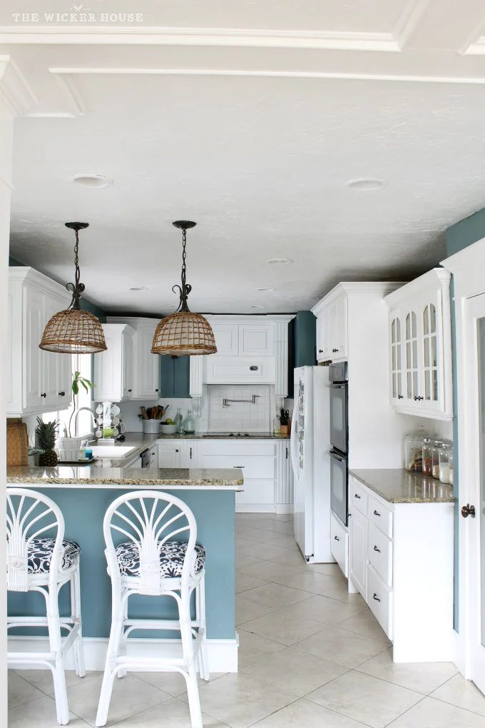 Wall color is Aegean Teal from Benjamin Moore. Color Spotlight on Bekob. Image via The Wicker House