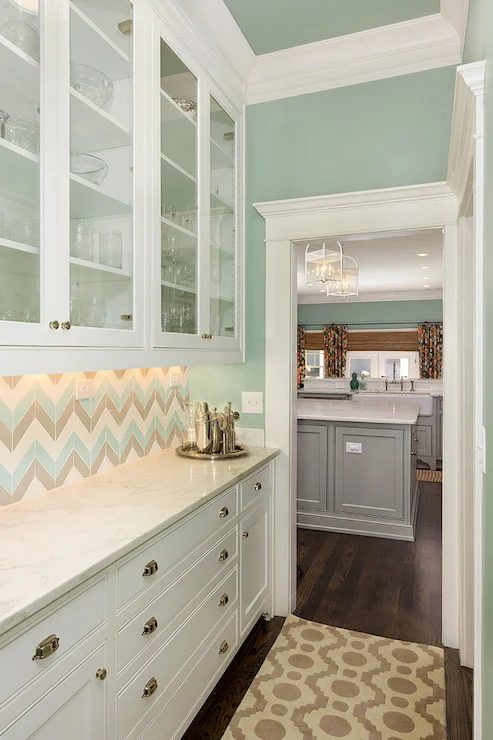 striking butler's pantry, with multi-color herringbone tile backsplash and white cabinets. (Wall color is Wythe Blue from Benjamin Moore.)