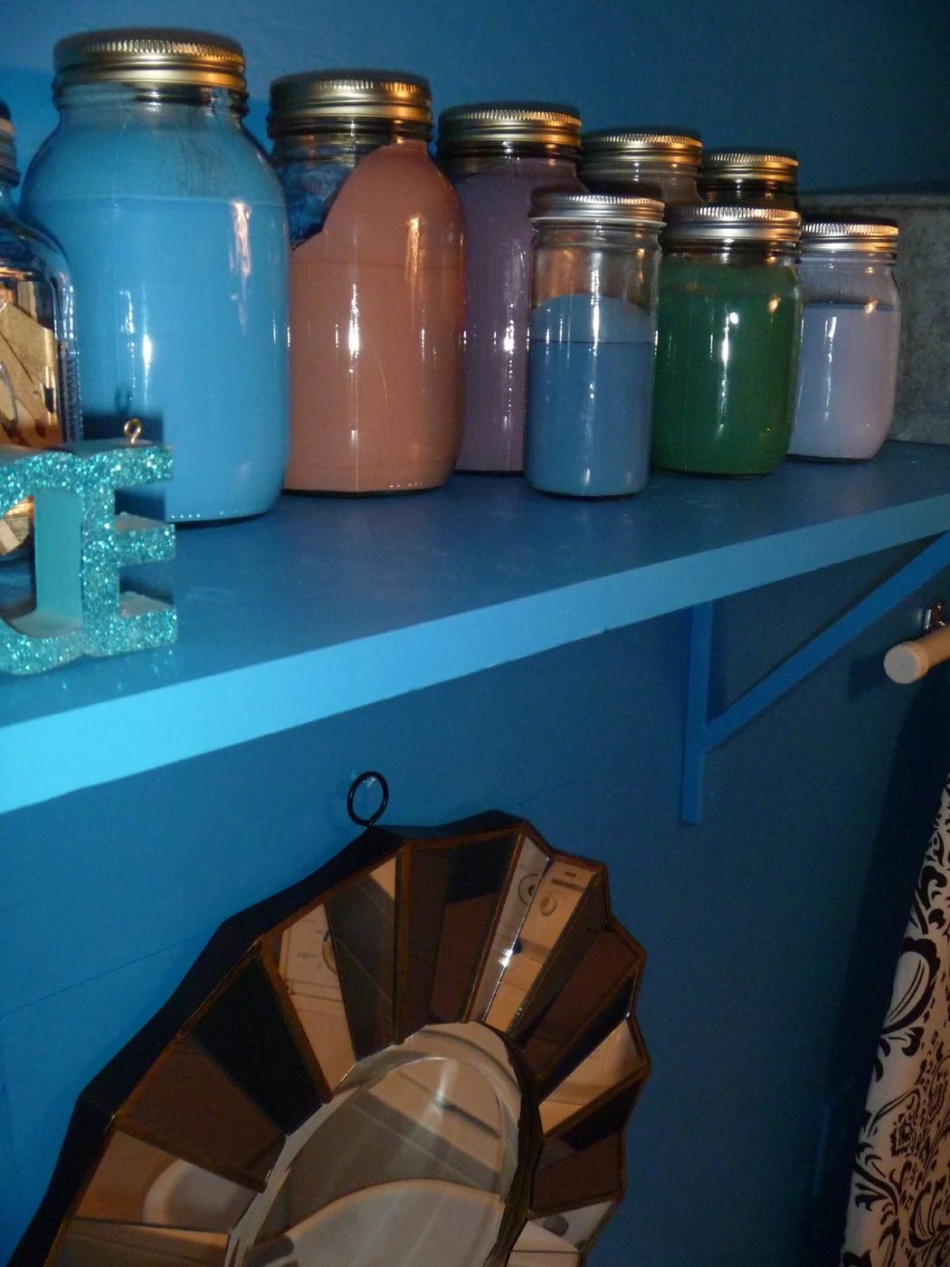 striking Blue Laundry Room Makeover Laundry storage (8)