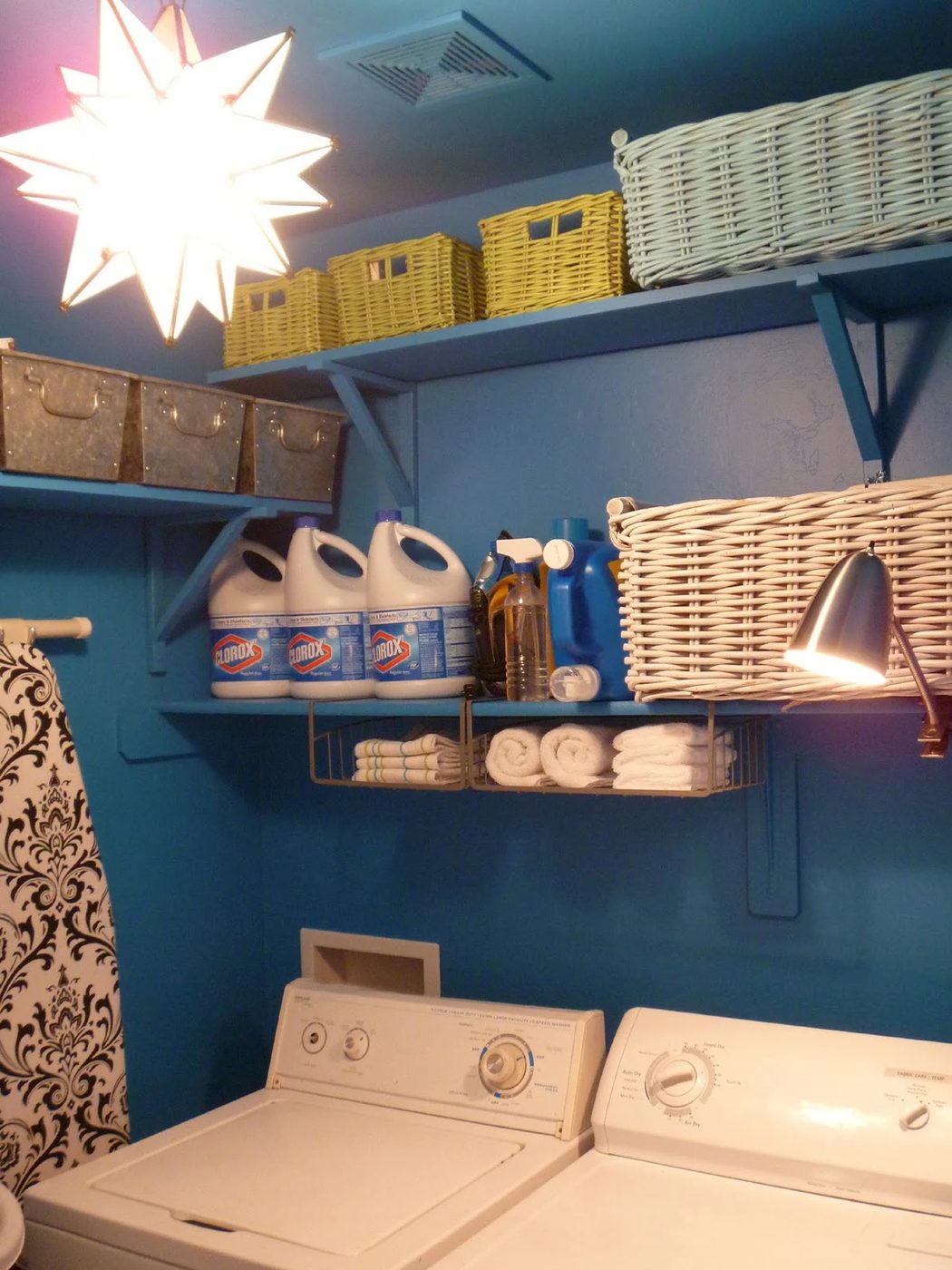 striking Blue Laundry Room Makeover Laundry storage (7)