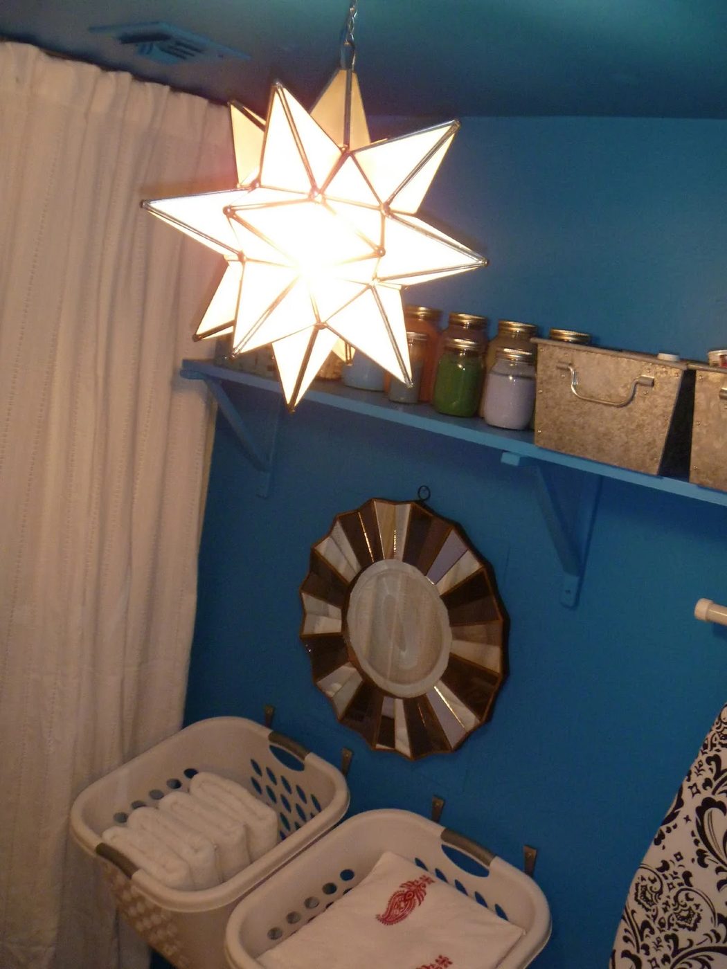 striking Blue Laundry Room Makeover Laundry storage (6)