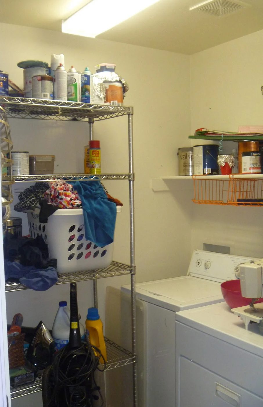striking Blue Laundry Room Makeover Laundry storage (1)