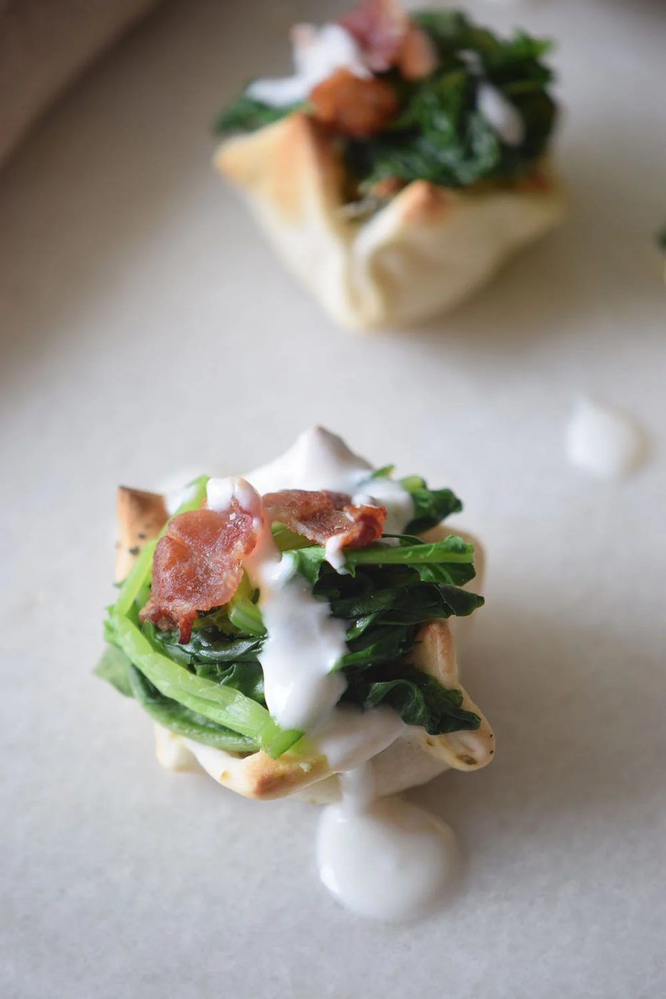 A yummy and pretty appetizer to share at your next party! Cream Cheese Spinach Puffs via Bekob.com