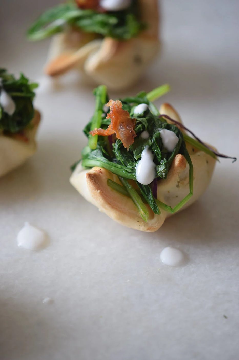 A yummy and pretty appetizer to share at your next party! Cream Cheese Spinach Puffs via Bekob.com