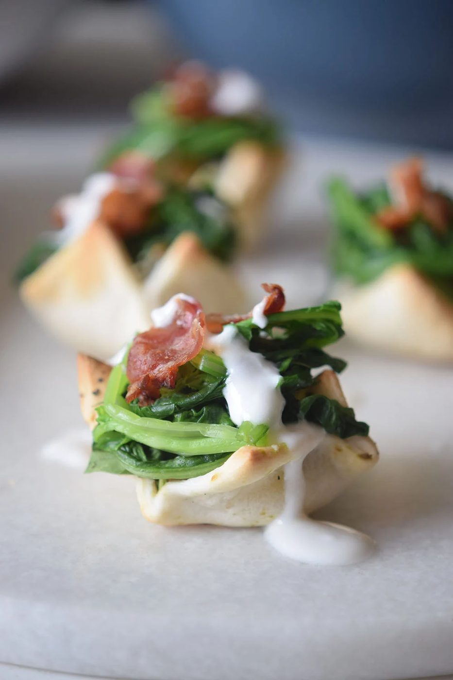 A yummy and pretty appetizer to share at your next party! Cream Cheese Spinach Puffs via Bekob.com
