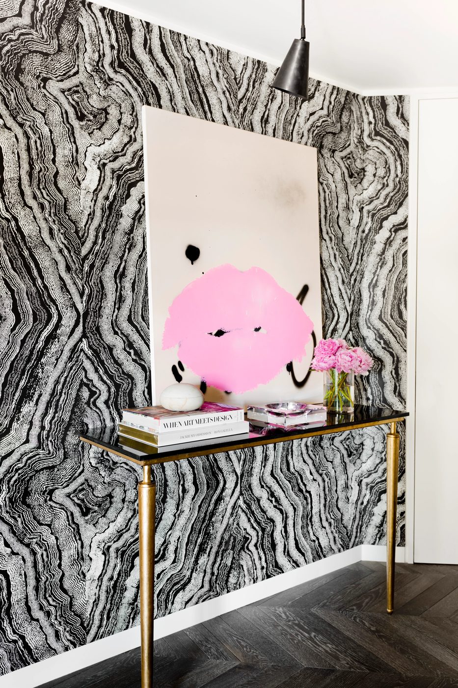 vivid black and white entry with wallpaper and a pop of color (designed by Tamara Magel via @Bekob)