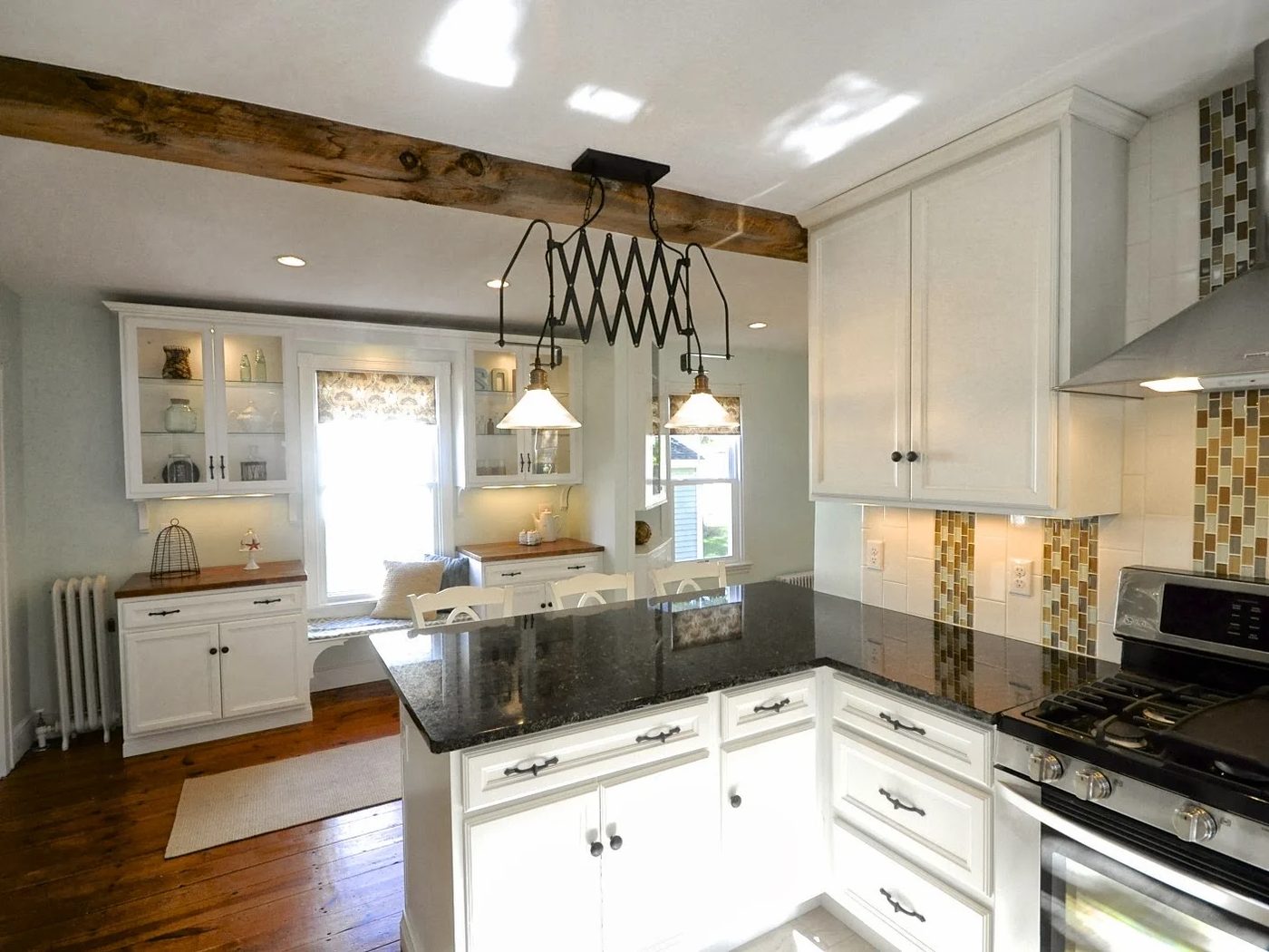 white new englander kitchen update with wood floors, SoPo Cottage featured on Bekob
