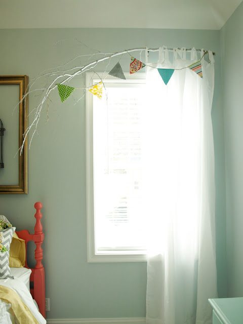 Less Than well fitted Life of Bliss - painted branch curtain rod - via Bekob
