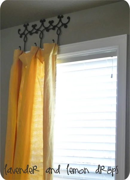 Lavender and Lemon Drops wrought iron coat or towel hanger to hang curtains via Bekob