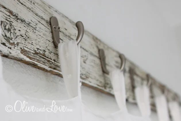 Olive and Love reclaimed wood curtain hooks via Bekob