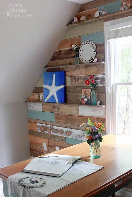 creative-handmade-pallet-projects-how-to-install-a-pallet-scrap-wood-wall-with-decor-ledges-pretty-handy-girl