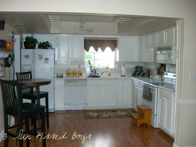 1 Liven up a solid color kitchen by using colorful old fuses as hardware for kitchen cabinets by 3 Sunkissed Boys featured on @Bekob