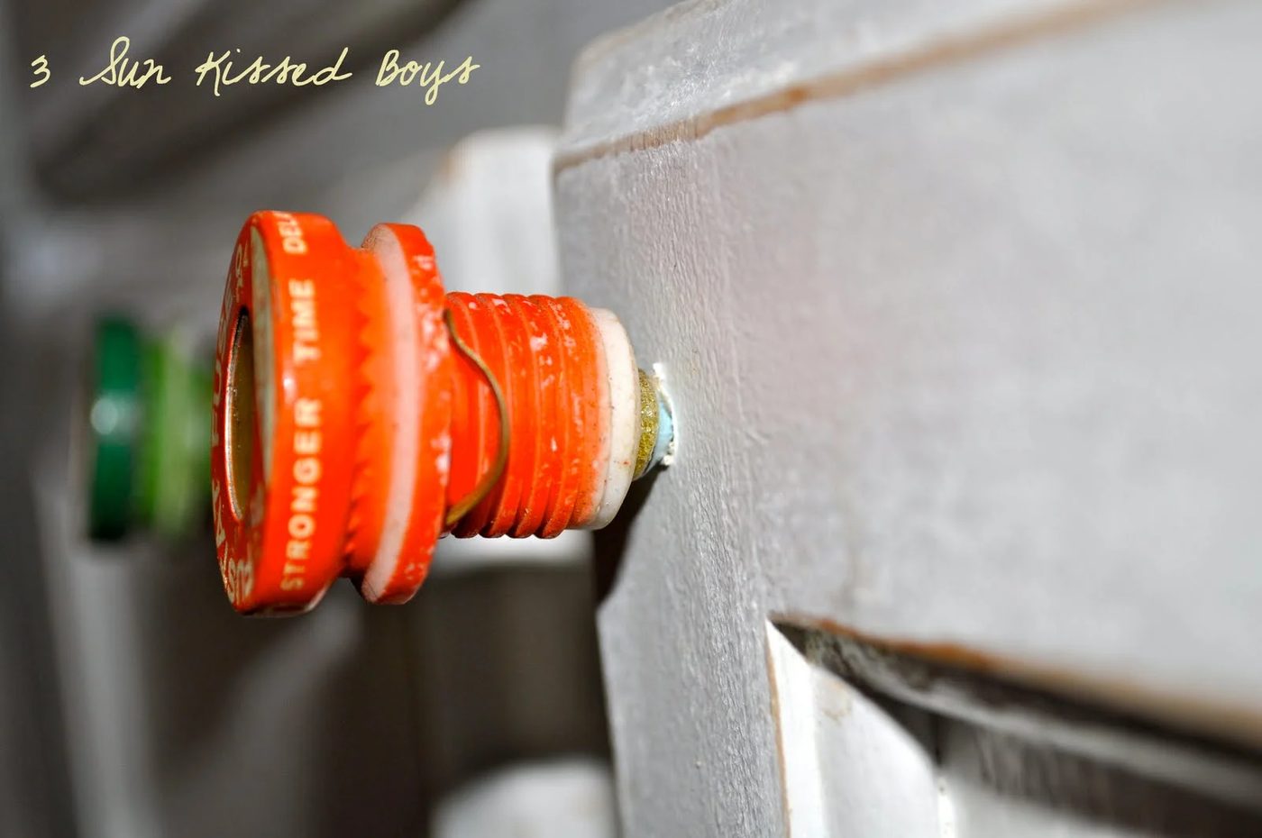 14 Fun, modest-cost-friendly update to an all white kitchen using repurposed old fuses by 3 Sunkissed Boys featured on @Bekob