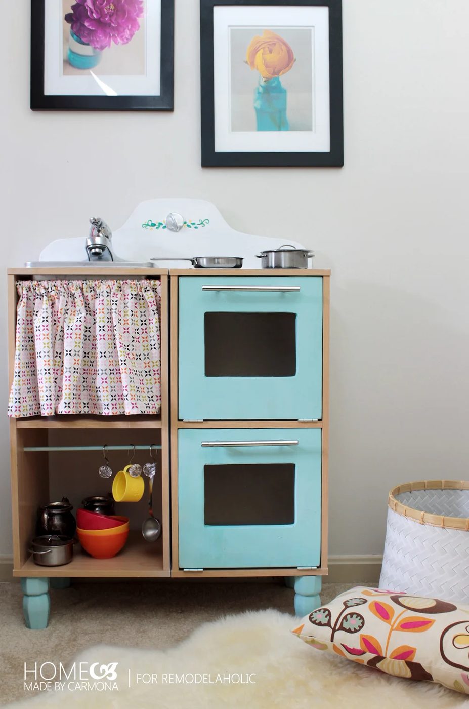 Seriously the CUTEST and easiest play kitchen ever. straightforward Handmade options for the sink, stovetop, double oven, and storage, that will hold up to kids actually playing.