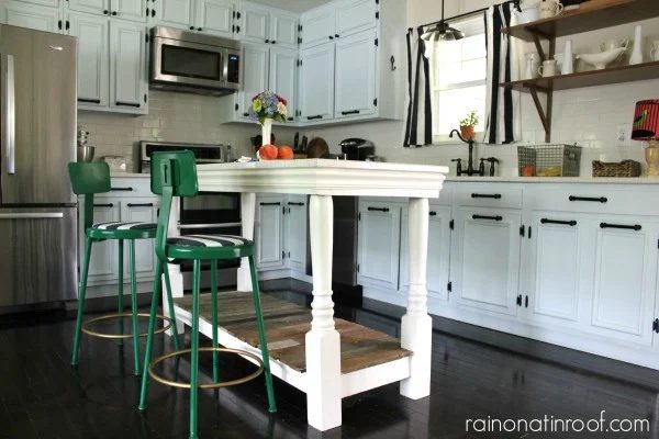 white painted cabinets and custom island in renovated kitchen, Rain On A Tin Roof featured on Bekob