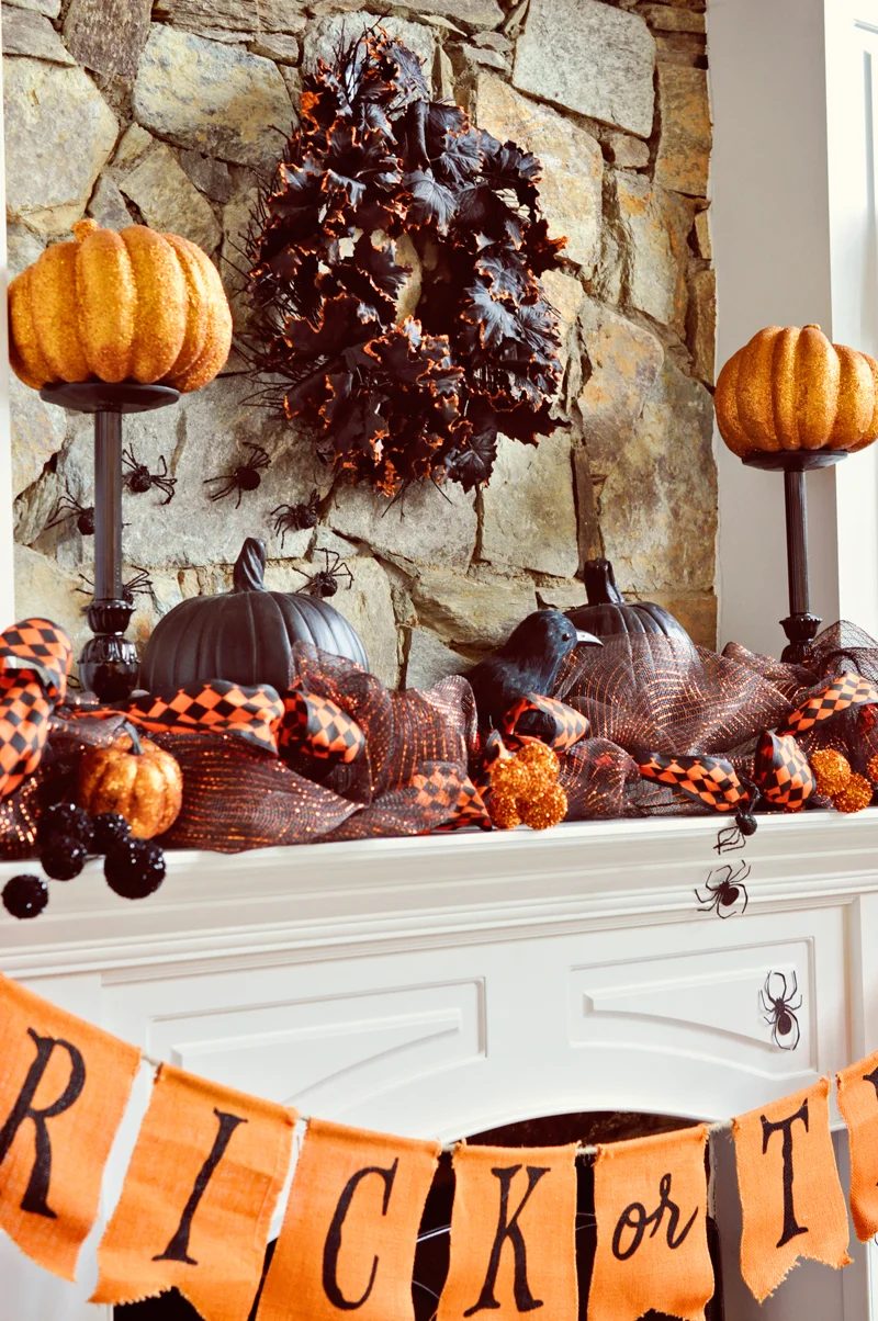 Spray painted lamps turned decor stands for the mantel | direct Halloween Decor options and Tutorials at Bekob.com