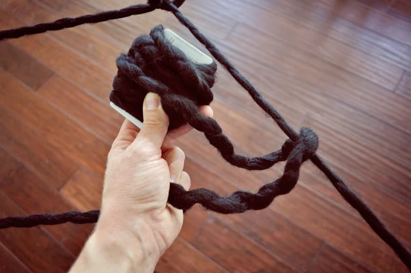 How to make an extra large spider web | straightforward decor for a Halloween party: an oversized yarn spiderweb, so straightforward to make but such a big impact! | direct Hallowe