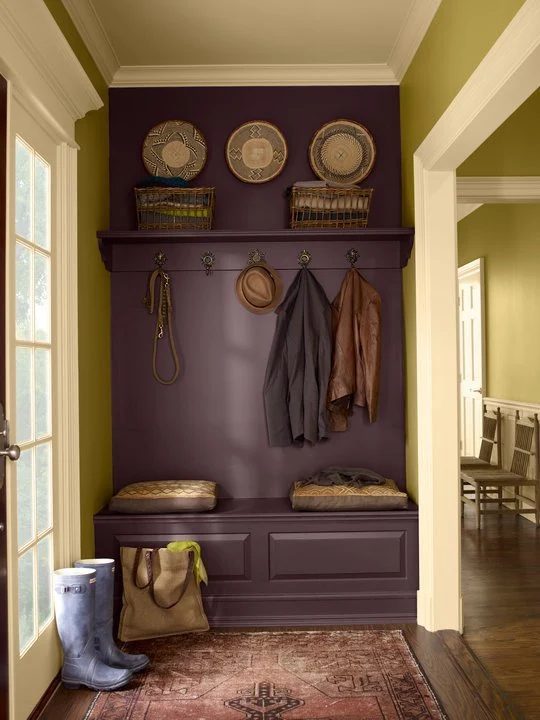 dark purple painted entry foyer (via Apartment Therapy)