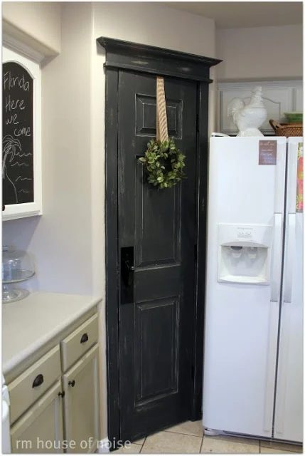 black pantry door with added trim, in Graphite Annie Sloan