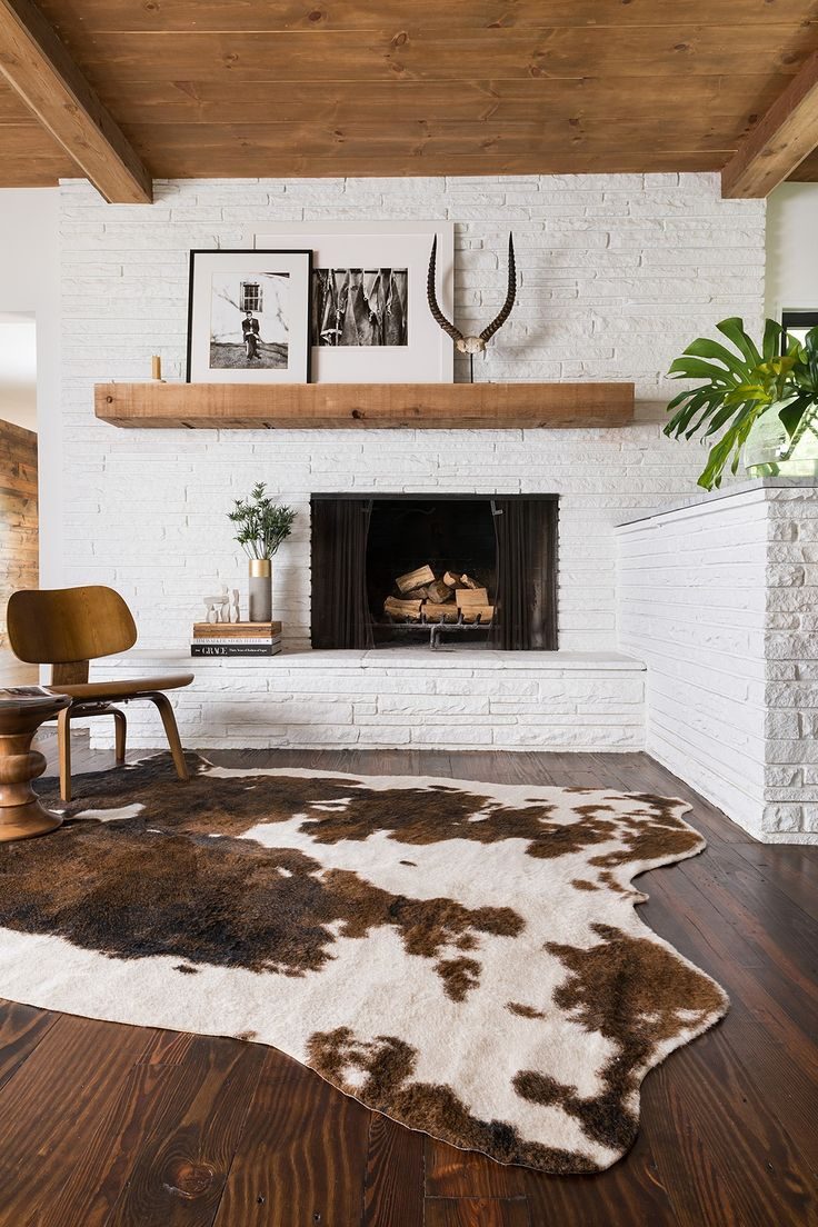 Brilliant! How to balance out an off-centered fireplace with a large mantel