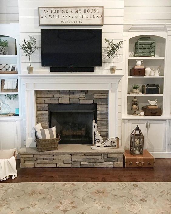 options for Decorating Around a TV Over the Fireplace Mantel, shiplap white fireplace and mantel via Our Vintage Nest