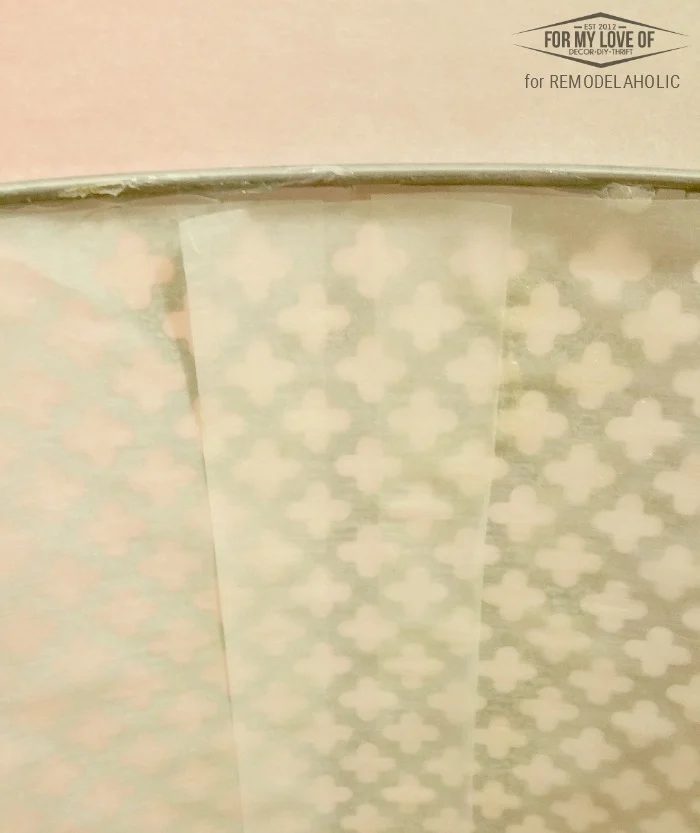 PRESS PARCHMENT PAPER ONTO THE INSIDE OF THE PUNCHED METAL SHADE