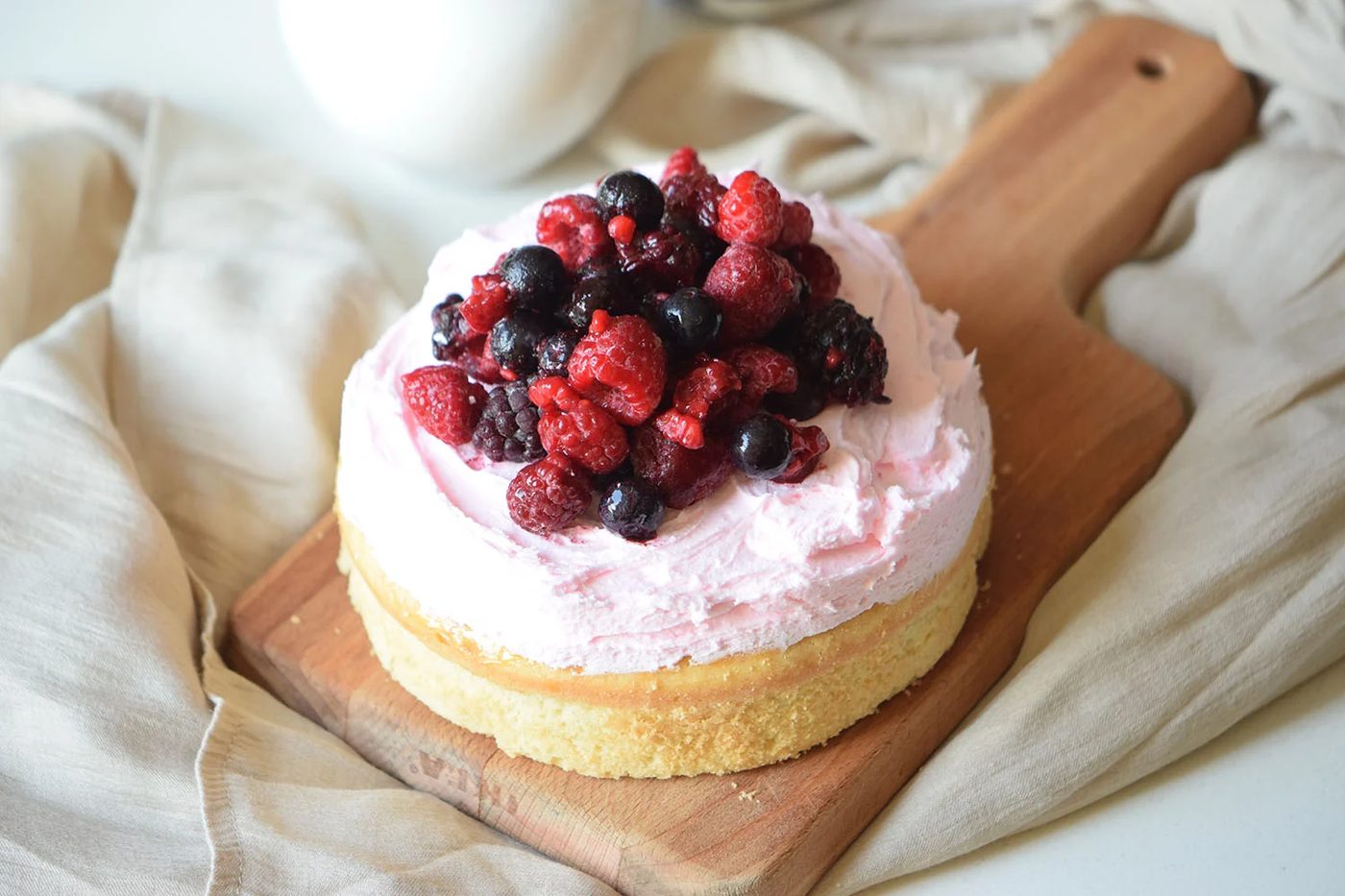 Berry Fields Cake is the well fitted summer cake, vanilla base and berry frosting all topped with some fresh berries. You'll want to make it every day