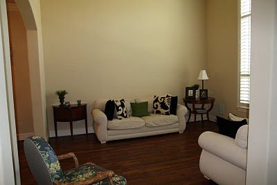 Designing-A-Living-Room-With-Tall-Walls-zebra-pattern-dyed-cow-hide (4)