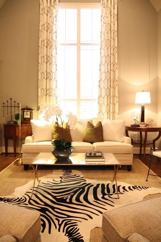 Designing-A-Living-Room-With-Tall-Walls-zebra-pattern-dyed-cow-hide (8)