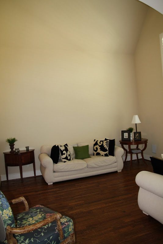 Designing-A-Living-Room-With-Tall-Walls-zebra-pattern-dyed-cow-hide (2)